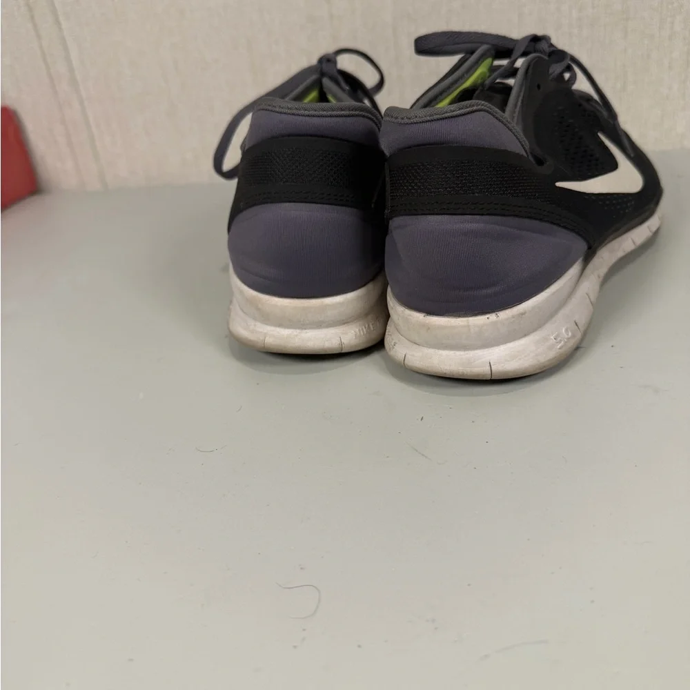 Nike Men’s Black Athletic Shoes with‎ White Swoosh and Lime Lining